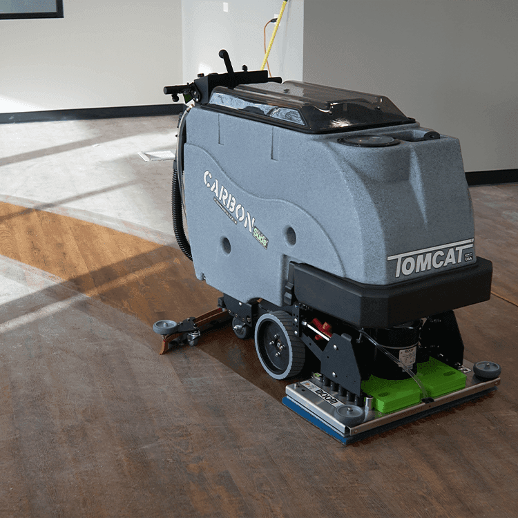 Tomcat floor scrubber showcasing its cleaning power