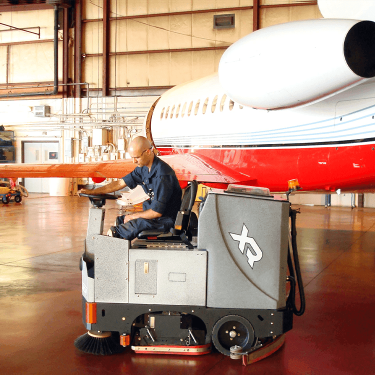 Tomcat floor scrubber showcasing its cleaning power