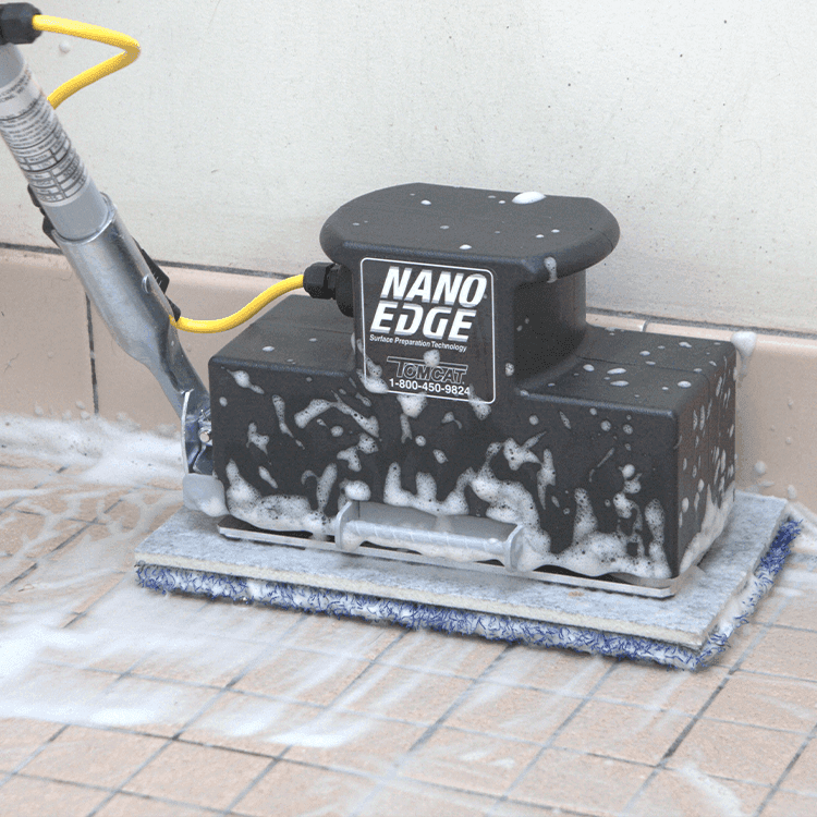Tomcat floor scrubber showcasing its cleaning power