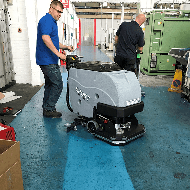 Tomcat floor scrubber showcasing its cleaning power