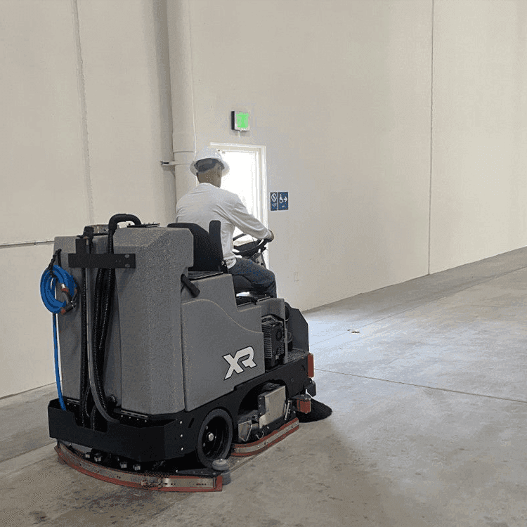 Tomcat floor scrubber showcasing its cleaning power