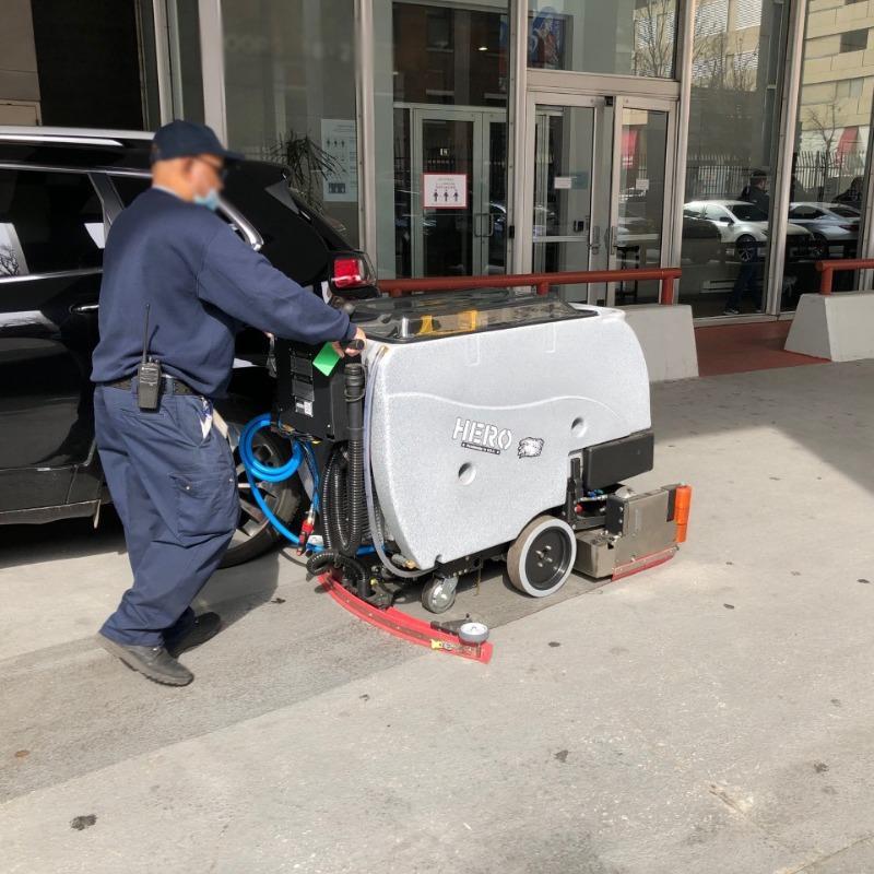 Tomcat Walk Behind Floor Scrubbers Hero drive in lane concrete A Tomcat HERO Walk Behind Floor Scrubber cleans the concrete front drive of a Baltimore, Maryland hospital