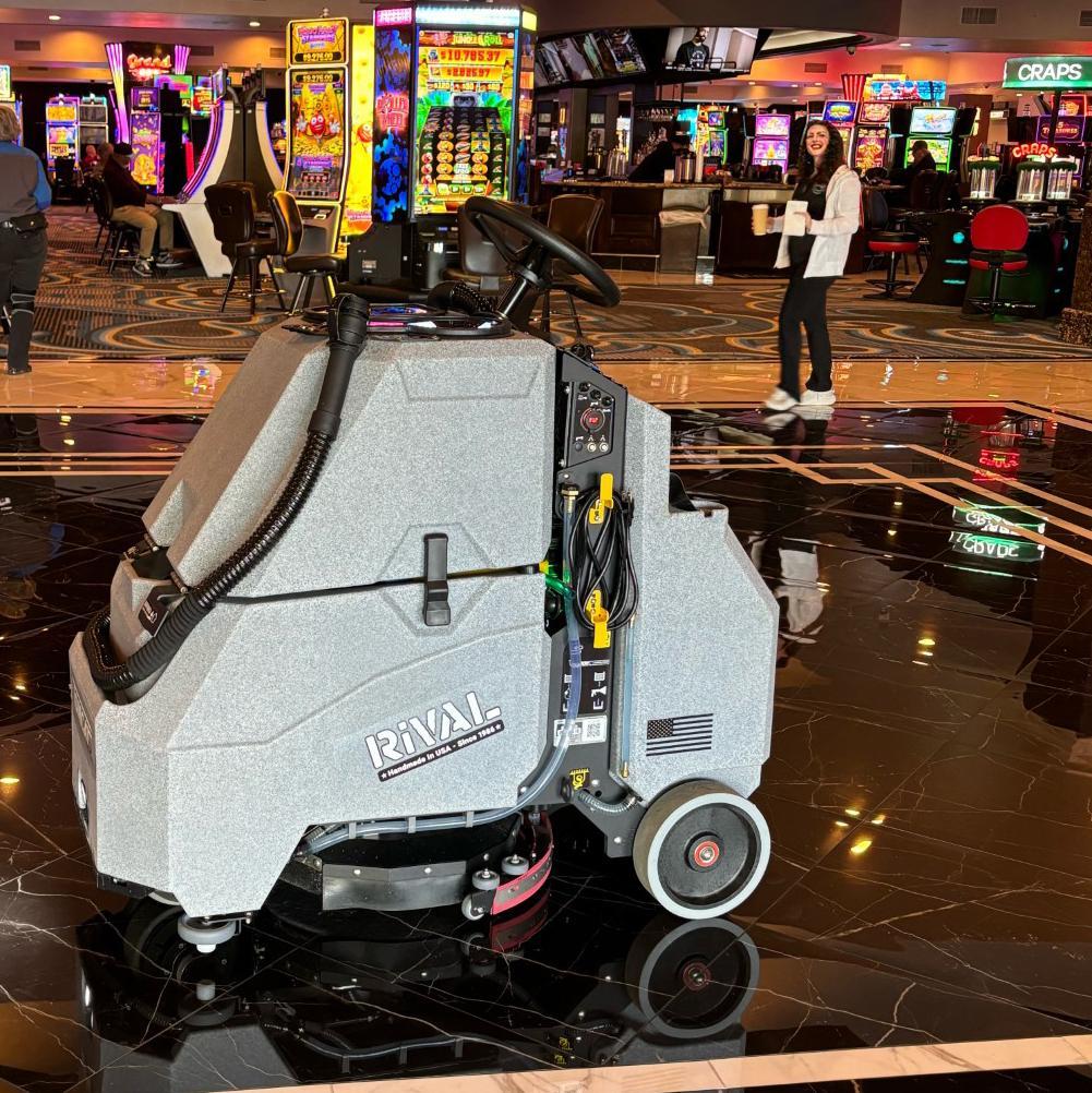 Tomcat Stand On Floor Scrubbers Rival lobby marble The Tomcat Rival stand on floor scrubber cleans crystalized marble floors in a Nevada casino lobby.